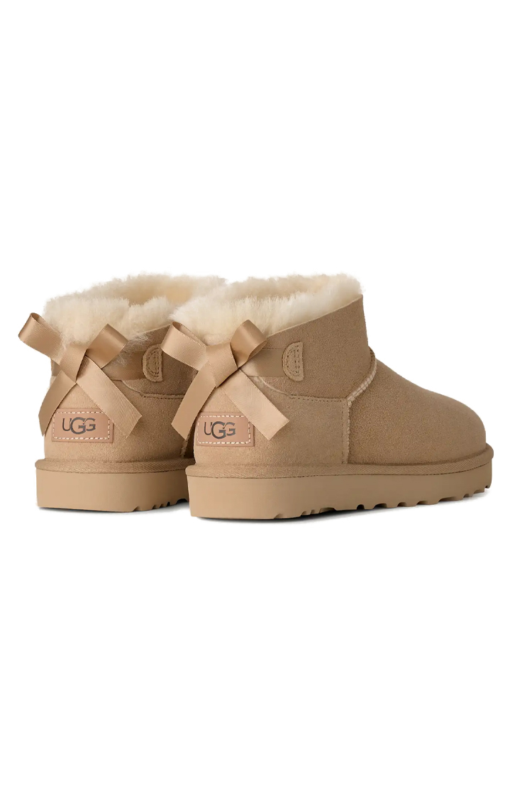 מגפון עור אג UGG קרם דגם Ultra Mini Bailey Bow עור כבש דו צדדי פפיון בטנת צמר