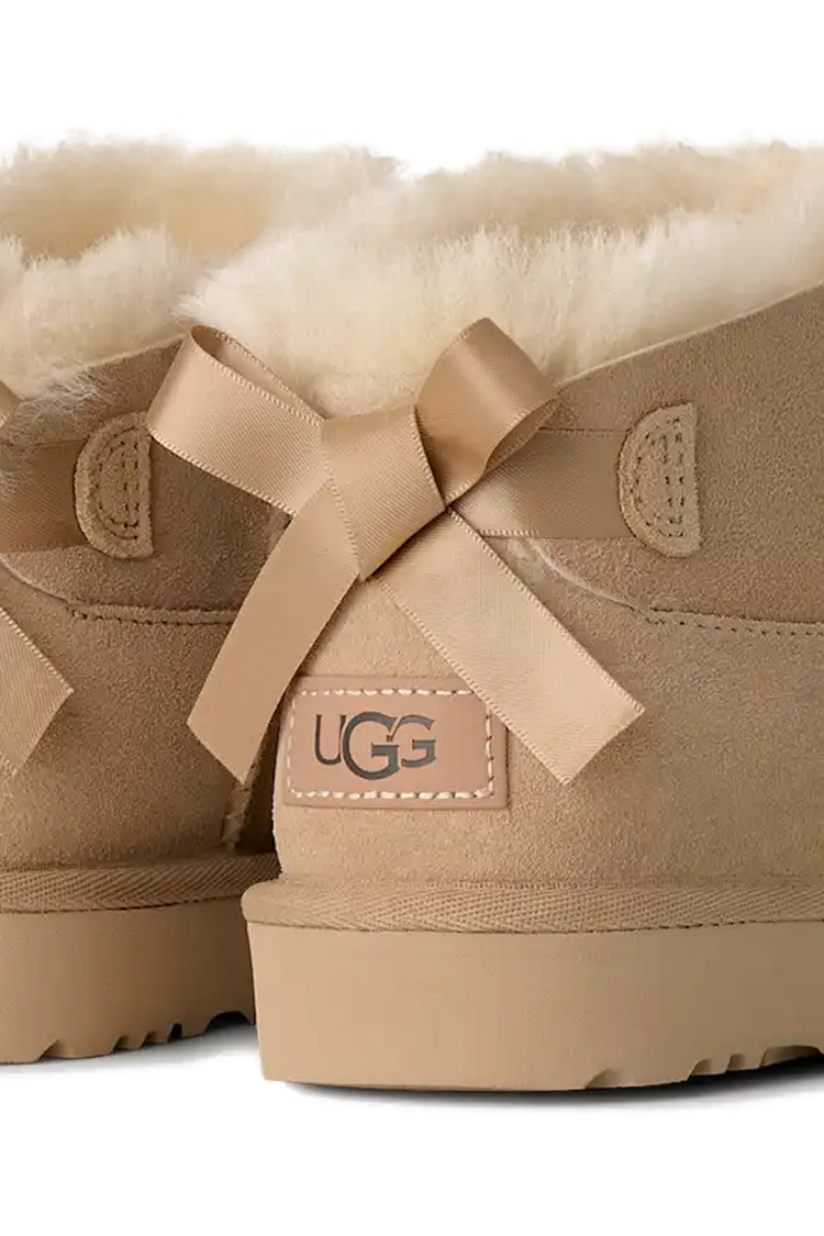 מגפון עור אג UGG קרם דגם Ultra Mini Bailey Bow עור כבש דו צדדי פפיון בטנת צמר