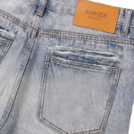 מכנס ג’ינס איינקר AINKER בהיר דגם Brunel Black 1154 גזרה טייפרוד קרעים מינימליסטיים פאץ עור