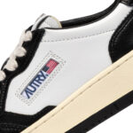 סניקרס אוטרי autry שחור/לבן דגם MEDALIST LOW BICOLOR עור זמש פאנלים עקב קונטרסט לוגו דגל”