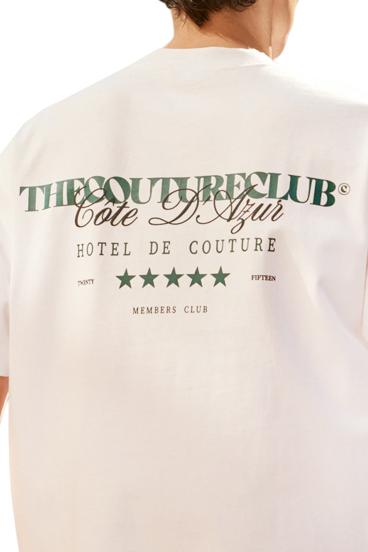 טי שירט קוטור קלאב The Couture Club לבן ירוק דגם Hotel De Couture הדפס מלון בחזה ובגב