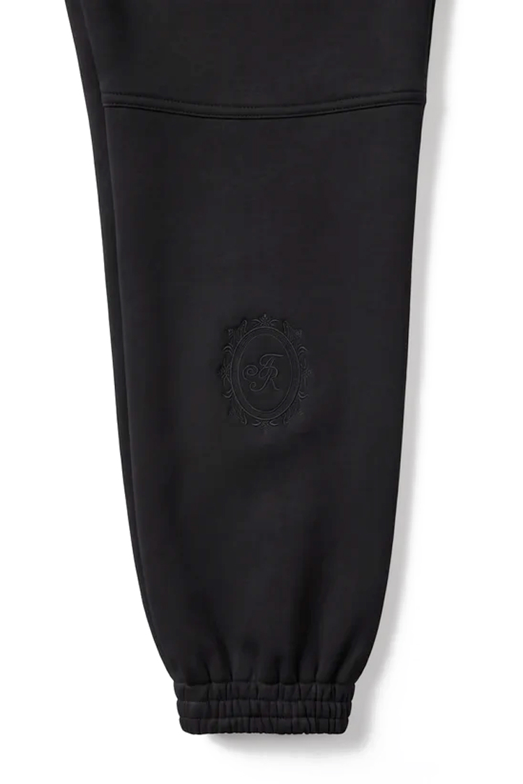 מכנס טרנינג אינקר ainker שחור דגם 1069 navy pant אריגת interlock צפופה צללית מחודדת רקמת לוגו צד תחתית שרוול
