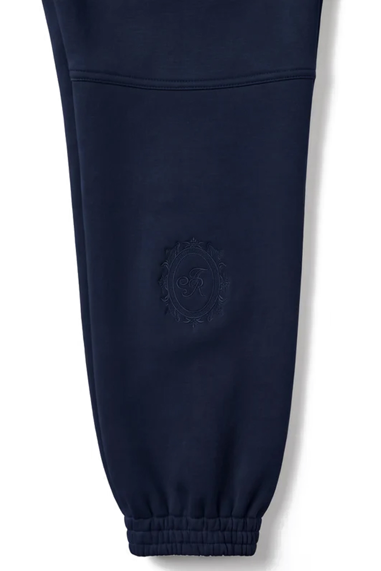 מכנס טרנינג איינקר ainker כחול דגם 1069 navy pant אריגת interlock צפופה צללית מחודדת רקמת לוגו צד תחתית שרוול